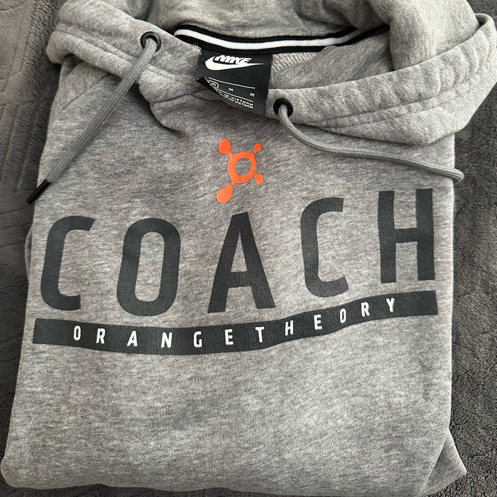 OTF Coach Nike hoodie.
